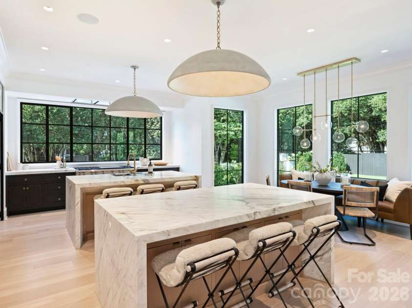 600 Hermitage Road, Charlotte, NC 28207.  MLS# CAR4422657, YatesRealty ID 52142. Double marble waterfall islands