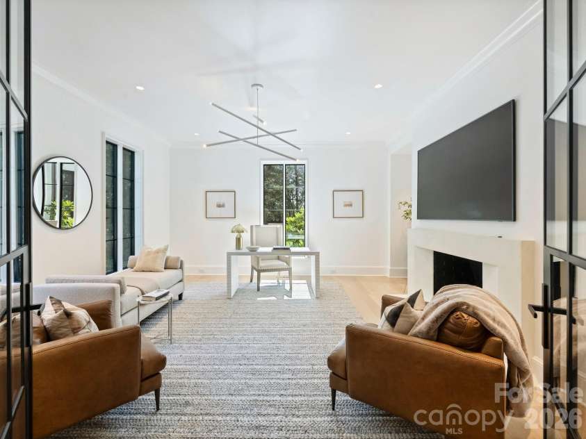 600 Hermitage Road, Charlotte, NC 28207.  MLS# CAR4422657, YatesRealty ID 52142. Private study with wood burning fireplace