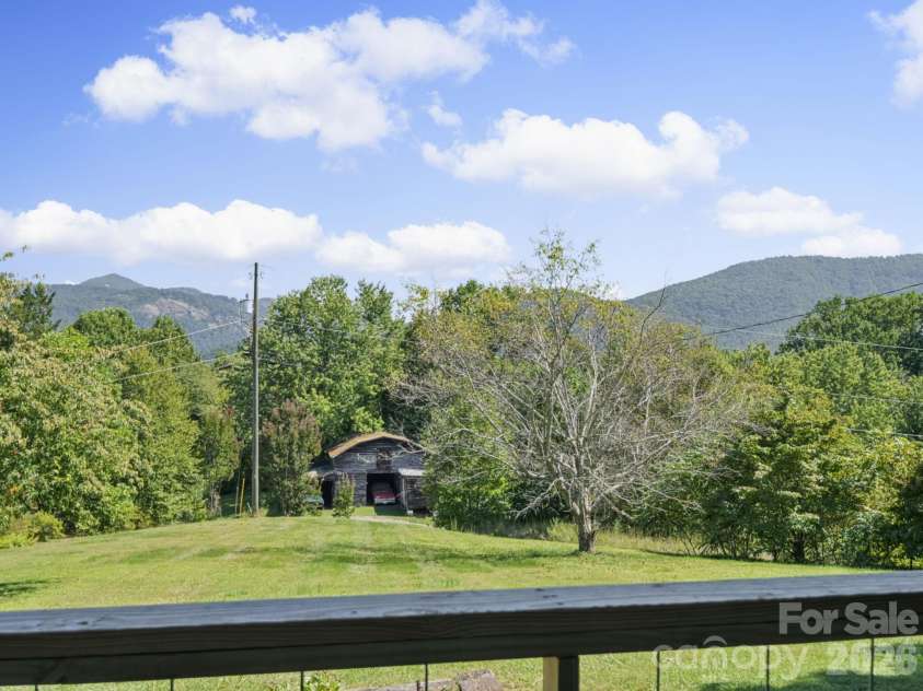727 Lyda Road, Hendersonville, NC 28792.  MLS# CAR4426316, YatesRealty ID 52153. Amazing Front porch view