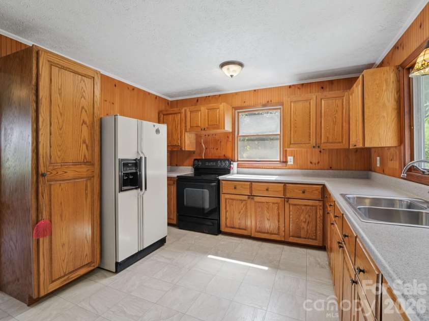 727 Lyda Road, Hendersonville, NC 28792.  MLS# CAR4426316, YatesRealty ID 52153. Another view of kitchen