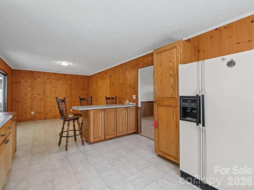 727 Lyda Road, Hendersonville, NC 28792.  MLS# CAR4426316, YatesRealty ID 52153. Dining area next to kitchen