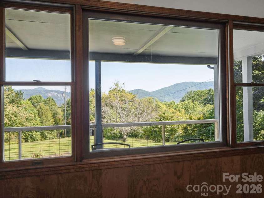 727 Lyda Road, Hendersonville, NC 28792.  MLS# CAR4426316, YatesRealty ID 52153. Great views from living room.
