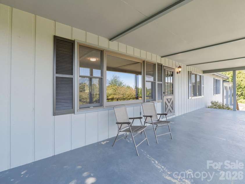 727 Lyda Road, Hendersonville, NC 28792.  MLS# CAR4426316, YatesRealty ID 52153. Large front porch