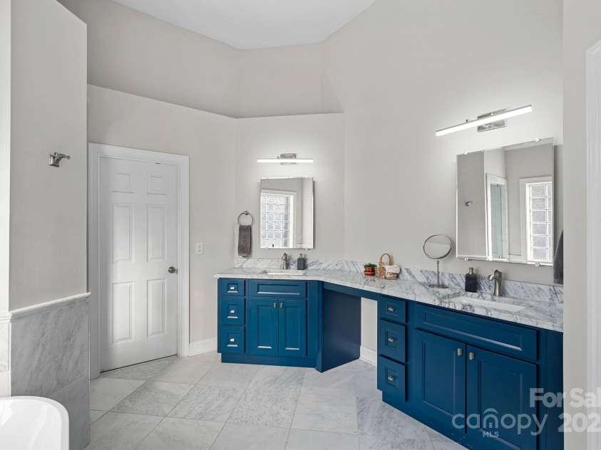 18334 Dembridge Drive, Davidson, NC 28036.  MLS# CAR4231827, YatesRealty ID 5216. Primary Bath with Carrera Marble