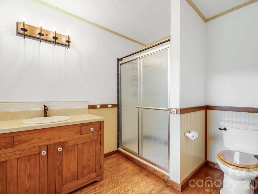 53 Armstrong Road, Etowah, NC 28729.  MLS# CAR4426769, YatesRealty ID 52169. Primary Bath