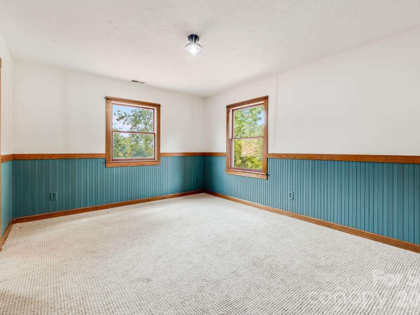 53 Armstrong Road, Etowah, NC 28729.  MLS# CAR4426769, YatesRealty ID 52169. Upstairs Bedroom