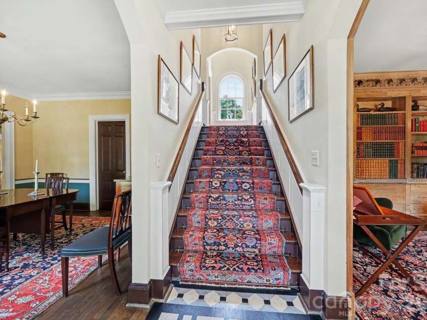 1401 Queens Road, Charlotte, NC 28207.  MLS# CAR4417618, YatesRealty ID 52181. Front staircase
