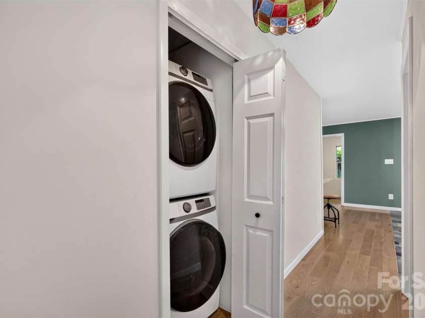 9 Good Neighbor Ridge, Weaverville, NC 28787.  MLS# CAR4424613, YatesRealty ID 52184. Hall laundry closet with stackables