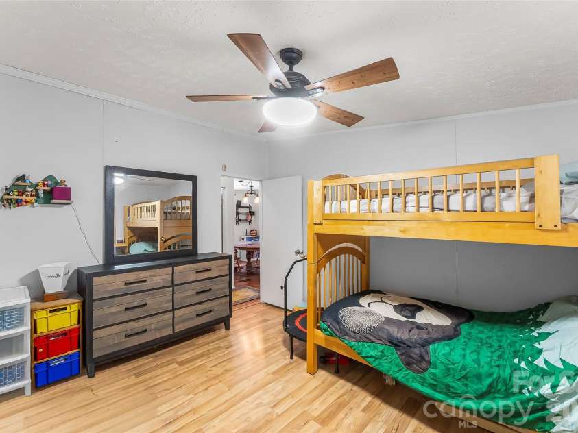 245 Merry Way, Clyde, NC 28721.  MLS# CAR4419042, YatesRealty ID 52197. Bedroom 3 with walk-in closet
