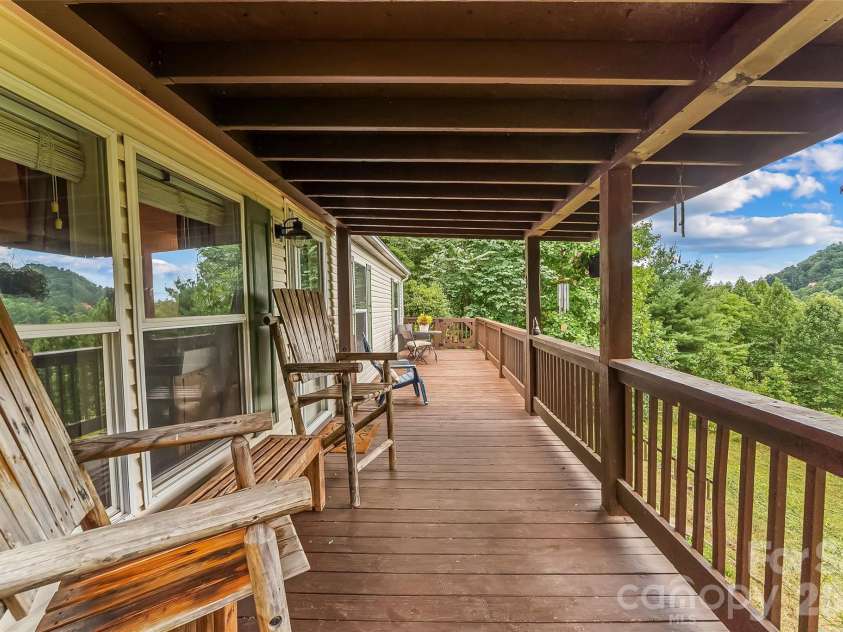 245 Merry Way, Clyde, NC 28721.  MLS# CAR4419042, YatesRealty ID 52197. Gorgeous views from covered and uncovered porches