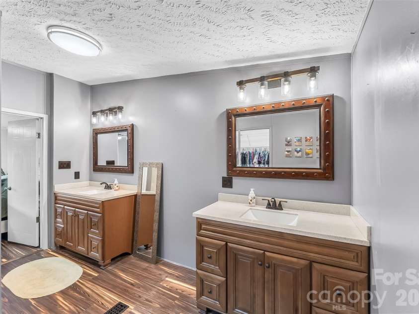245 Merry Way, Clyde, NC 28721.  MLS# CAR4419042, YatesRealty ID 52197. Large updated primary bathroom
