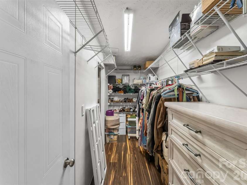 245 Merry Way, Clyde, NC 28721.  MLS# CAR4419042, YatesRealty ID 52197. Massive walk-through primary closet
