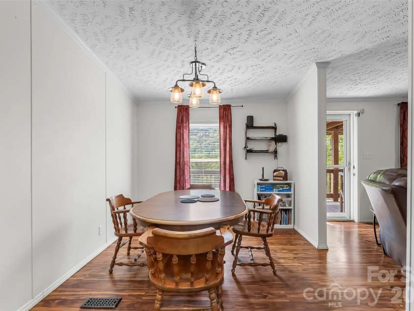 245 Merry Way, Clyde, NC 28721.  MLS# CAR4419042, YatesRealty ID 52197. Open layout throughout main living spaces