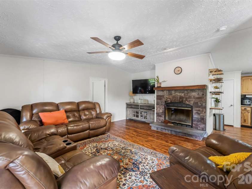245 Merry Way, Clyde, NC 28721.  MLS# CAR4419042, YatesRealty ID 52197. Open layout throughout main living spaces