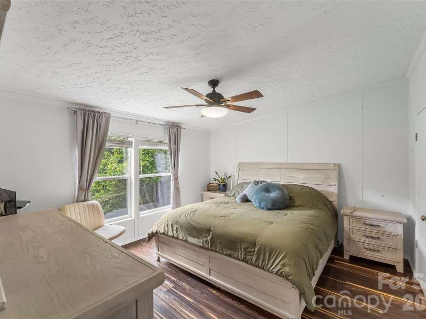 245 Merry Way, Clyde, NC 28721.  MLS# CAR4419042, YatesRealty ID 52197. Spacious primary suite