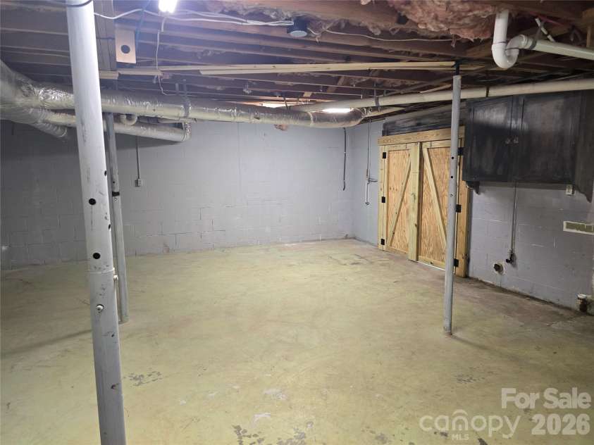 506 Pine Street, Landis, NC 28088.  MLS# CAR4426832, YatesRealty ID 52228. Basement/Lawnmower enterance