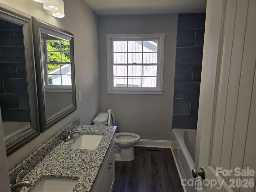 506 Pine Street, Landis, NC 28088.  MLS# CAR4426832, YatesRealty ID 52228. Hallway Bathroom
