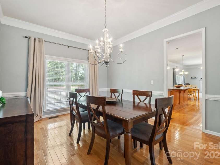 202 Weeping Spring Drive, Mooresville, NC 28115.  MLS# CAR4242789, YatesRealty ID 5224. Formal Dining room just off the large kitchen