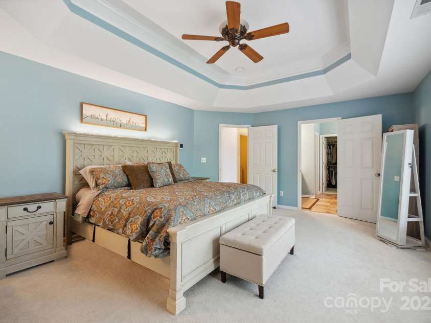 202 Weeping Spring Drive, Mooresville, NC 28115.  MLS# CAR4242789, YatesRealty ID 5224. Primary Suite is located back of home