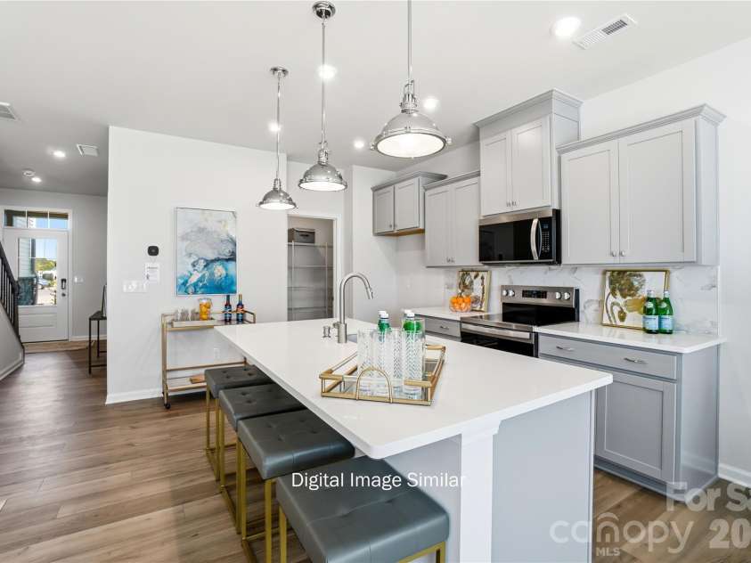 5226 Wyes Oak Lane, Charlotte, NC 28269.  MLS# CAR4427135, YatesRealty ID 52257. Photos are representative