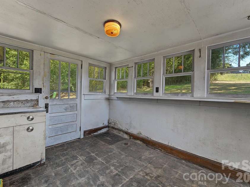 314 Trammell Avenue, Canton, NC 28716.  MLS# CAR4423892, YatesRealty ID 52265. Back porch/laundry area