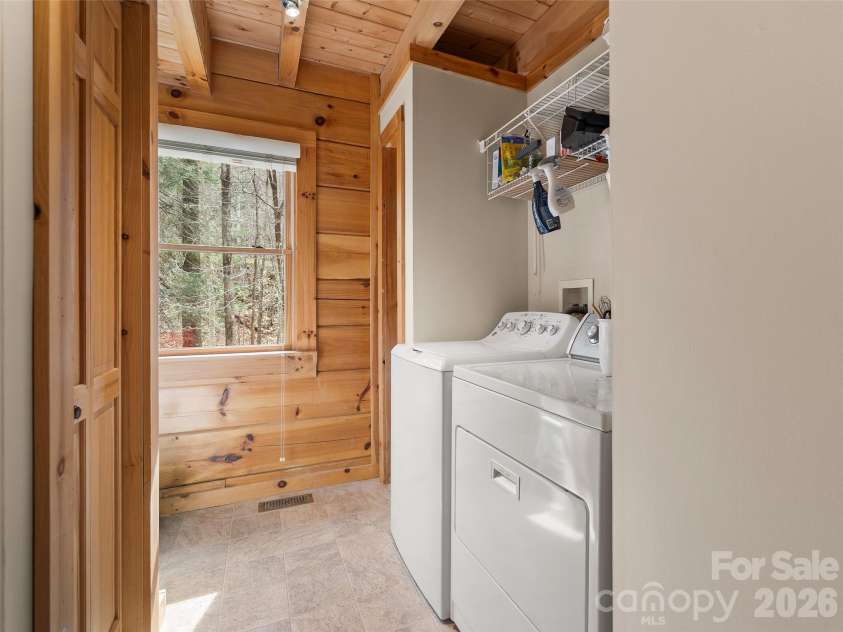 133 Smokemont Drive, Arden, NC 28704.  MLS# CAR4426881, YatesRealty ID 52266. Laundry and extra pantry space on the main floor