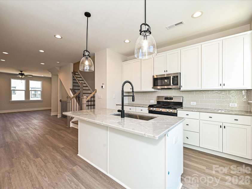 912 Callahan Street, Charlotte, NC 28206.  MLS# CAR4208861, YatesRealty ID 5227. Kitchen/Dining/Living