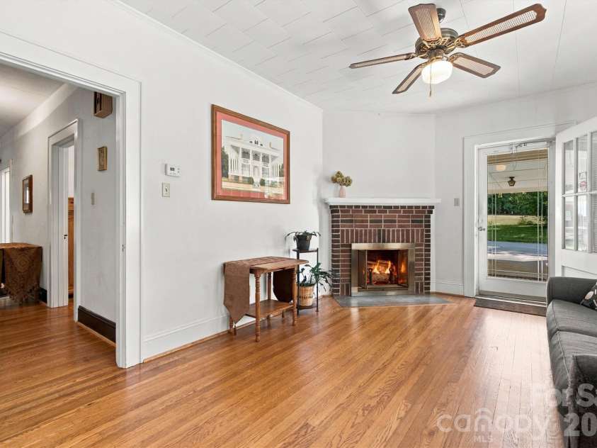 3336 Startown Road, Newton, NC 28658.  MLS# CAR4426940, YatesRealty ID 52276. Den/Fireplace & Side Entry View