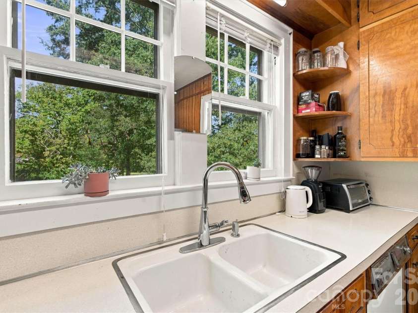 3336 Startown Road, Newton, NC 28658.  MLS# CAR4426940, YatesRealty ID 52276. Kitchen/Side Yard Window View