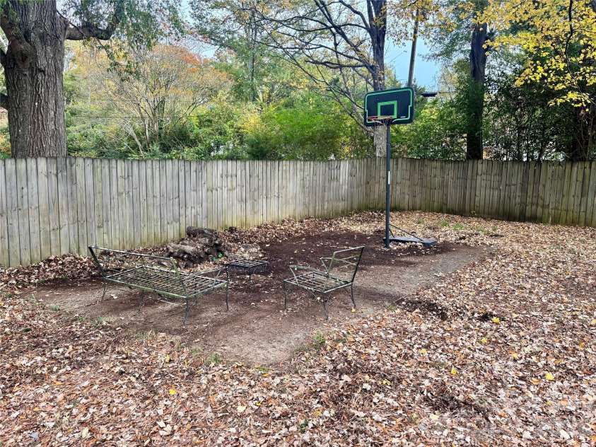 707 Barr Street, Lancaster, SC 29720.  MLS# CAR4426979, YatesRealty ID 52287. Cement pad in backyard