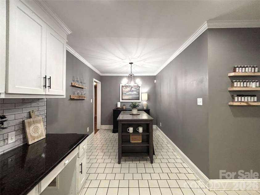 707 Barr Street, Lancaster, SC 29720.  MLS# CAR4426979, YatesRealty ID 52287. Dining area off kitchen