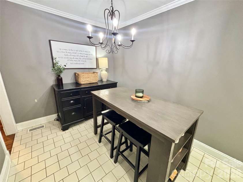 707 Barr Street, Lancaster, SC 29720.  MLS# CAR4426979, YatesRealty ID 52287. Dining area off kitchen