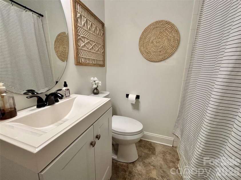 707 Barr Street, Lancaster, SC 29720.  MLS# CAR4426979, YatesRealty ID 52287. Full bathroom on main level