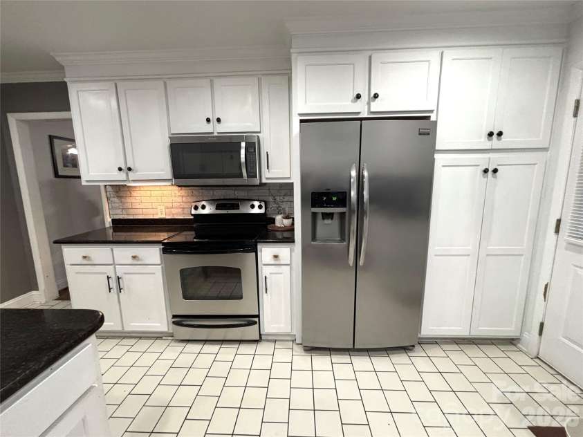 707 Barr Street, Lancaster, SC 29720.  MLS# CAR4426979, YatesRealty ID 52287. Kitchen
