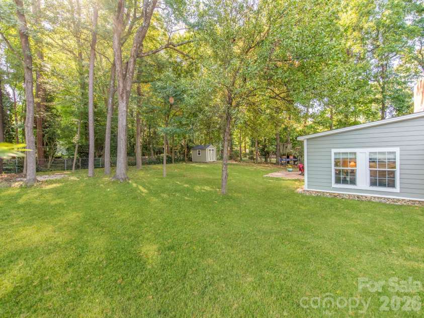 6821 Old Post Road, Charlotte, NC 28212.  MLS# CAR4426020, YatesRealty ID 52291. Flat backyard provides so much opportunity!