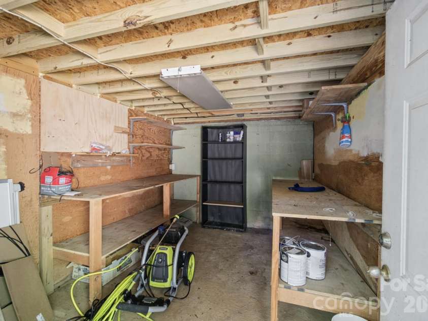35 Clement Drive, Asheville, NC 28805.  MLS# CAR4422265, YatesRealty ID 52299. Enclosed storage shed