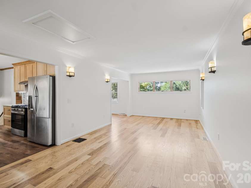 35 Clement Drive, Asheville, NC 28805.  MLS# CAR4422265, YatesRealty ID 52299. Living room (kitchen shown on left)