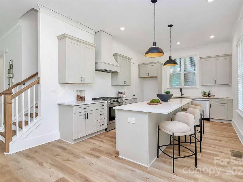 3230 Rogers Street, Charlotte, NC 28208.  MLS# CAR4164998, YatesRealty ID 5230. Large island with custom kitchen hood