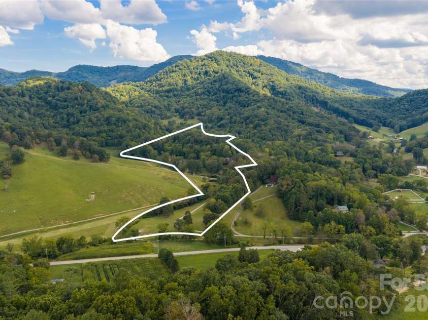 538 Celebration Cove, Clyde, NC 28721.  MLS# CAR4424841, YatesRealty ID 52304. 16.24 acres with over 200 acres of protected land to left, that cannot be developed is an absolute dream!