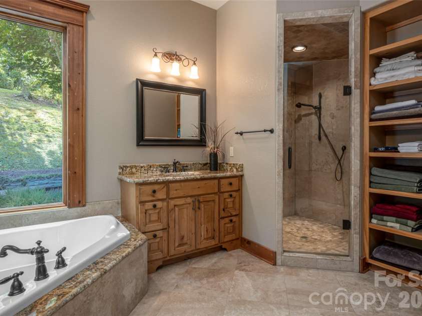 538 Celebration Cove, Clyde, NC 28721.  MLS# CAR4424841, YatesRealty ID 52304. Primary bath on Main