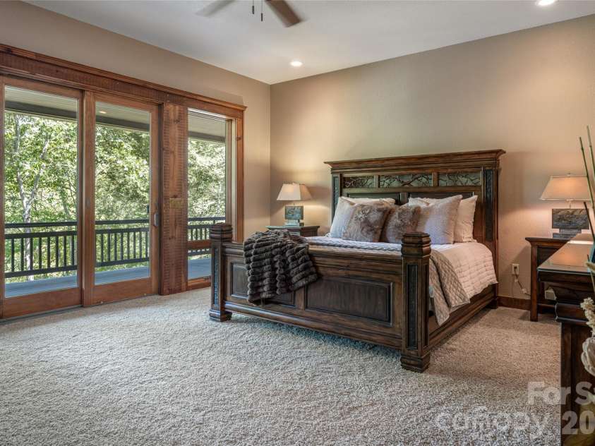 538 Celebration Cove, Clyde, NC 28721.  MLS# CAR4424841, YatesRealty ID 52304. Primary Suite on Main is revealed from a private hallway.