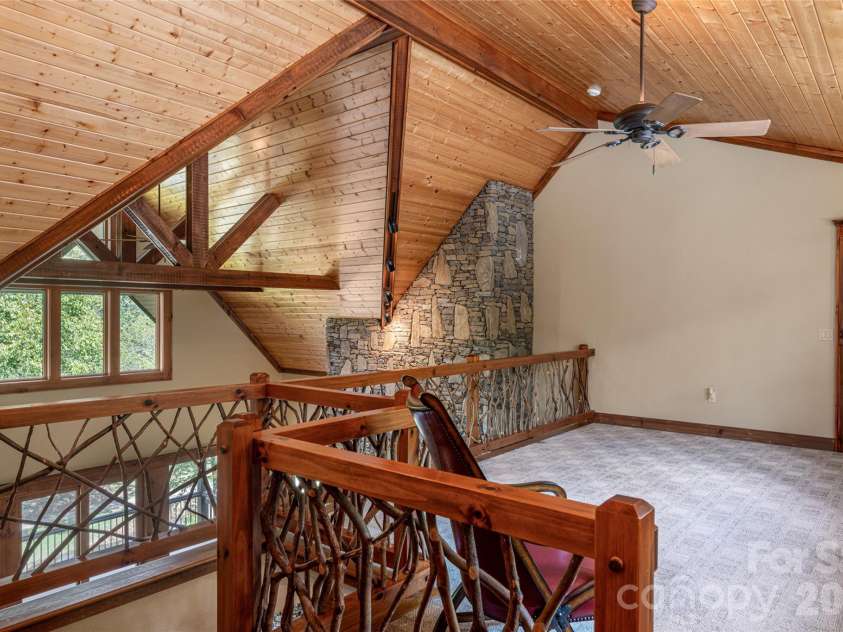 538 Celebration Cove, Clyde, NC 28721.  MLS# CAR4424841, YatesRealty ID 52304. Spacious loft joins the 3 upstairs rooms