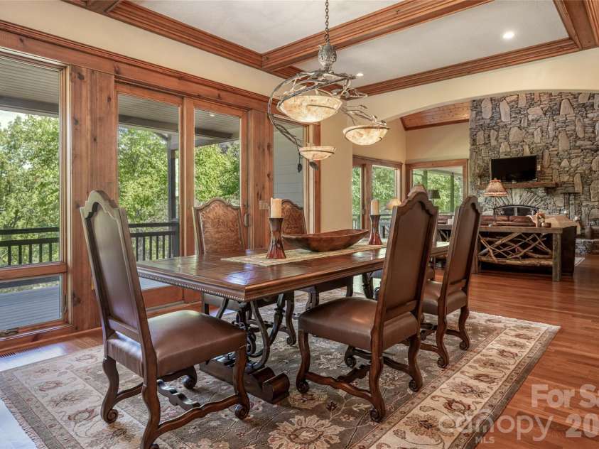 538 Celebration Cove, Clyde, NC 28721.  MLS# CAR4424841, YatesRealty ID 52304. This home works in harmony with the outdoors. Large picture windows and sliding doors invite the outside in at every turn