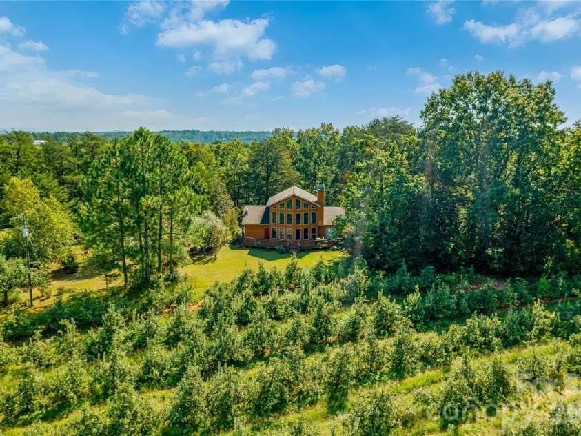 296 Acorn Lane, Rutherfordton, NC 28139.  MLS# CAR4427187, YatesRealty ID 52307. Over looking apple orchards/mountains
