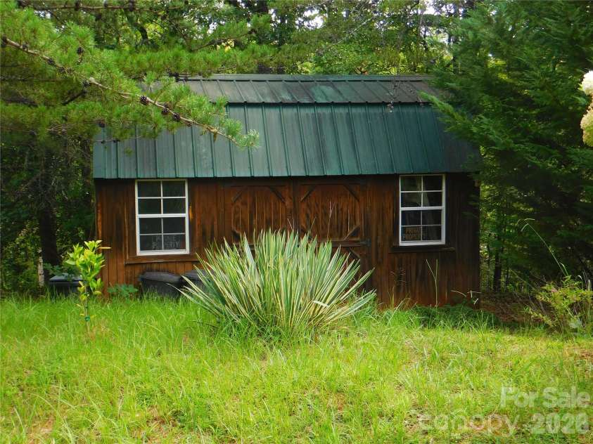 296 Acorn Lane, Rutherfordton, NC 28139.  MLS# CAR4427187, YatesRealty ID 52307. Storage shed