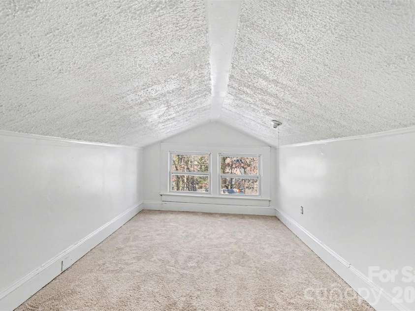 1013 Ridge Avenue, Gastonia, NC 28052.  MLS# CAR4341369, YatesRealty ID 5231. Additional flex room with limited ceiling height.