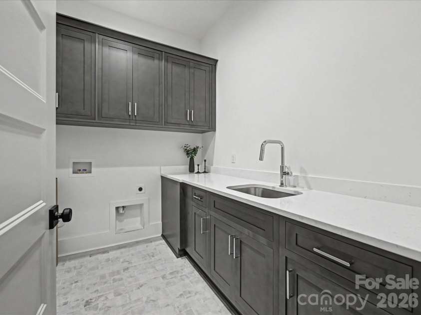 425 Snow Goose Walk None, Clover, SC 29710.  MLS# CAR4354242, YatesRealty ID 5236. Tons of folding surface and utility sink in laundry