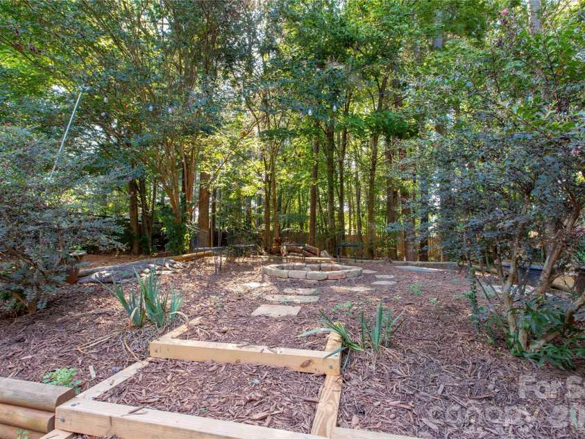 4260 Wiregrass Road, Indian Land, SC 29707.  MLS# CAR4426799, YatesRealty ID 52377. Fire pit in the yard for fall evenings!