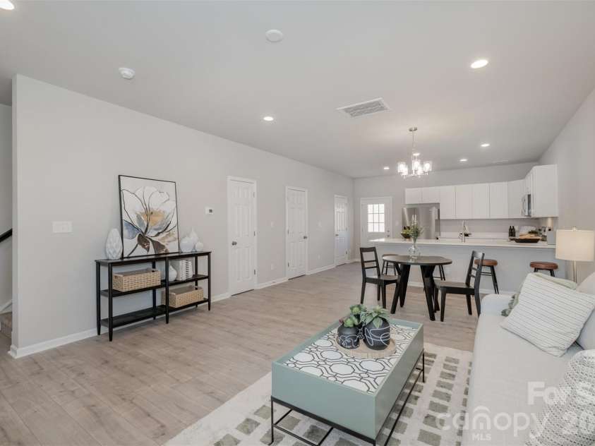 344D Lincoln Street, Concord, NC 28025.  MLS# CAR4355432, YatesRealty ID 5238. Living Room of Model