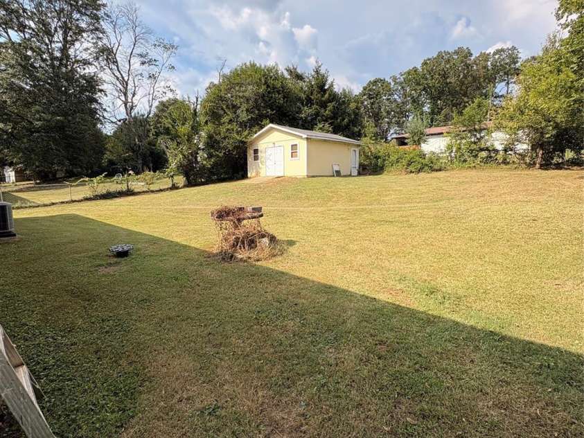 204 Nims Road, Mount Holly, NC 28120.  MLS# CAR4426810, YatesRealty ID 52380. Backyard